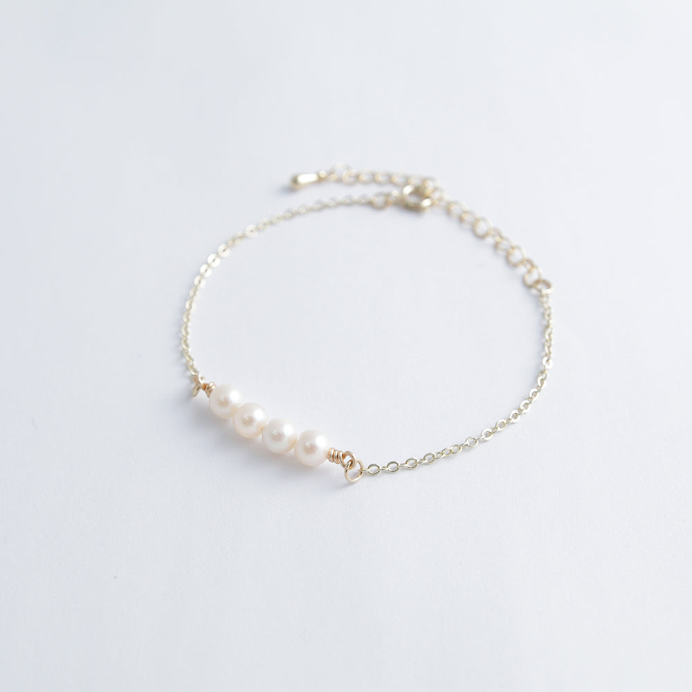Four-grain bracelet Bl/W